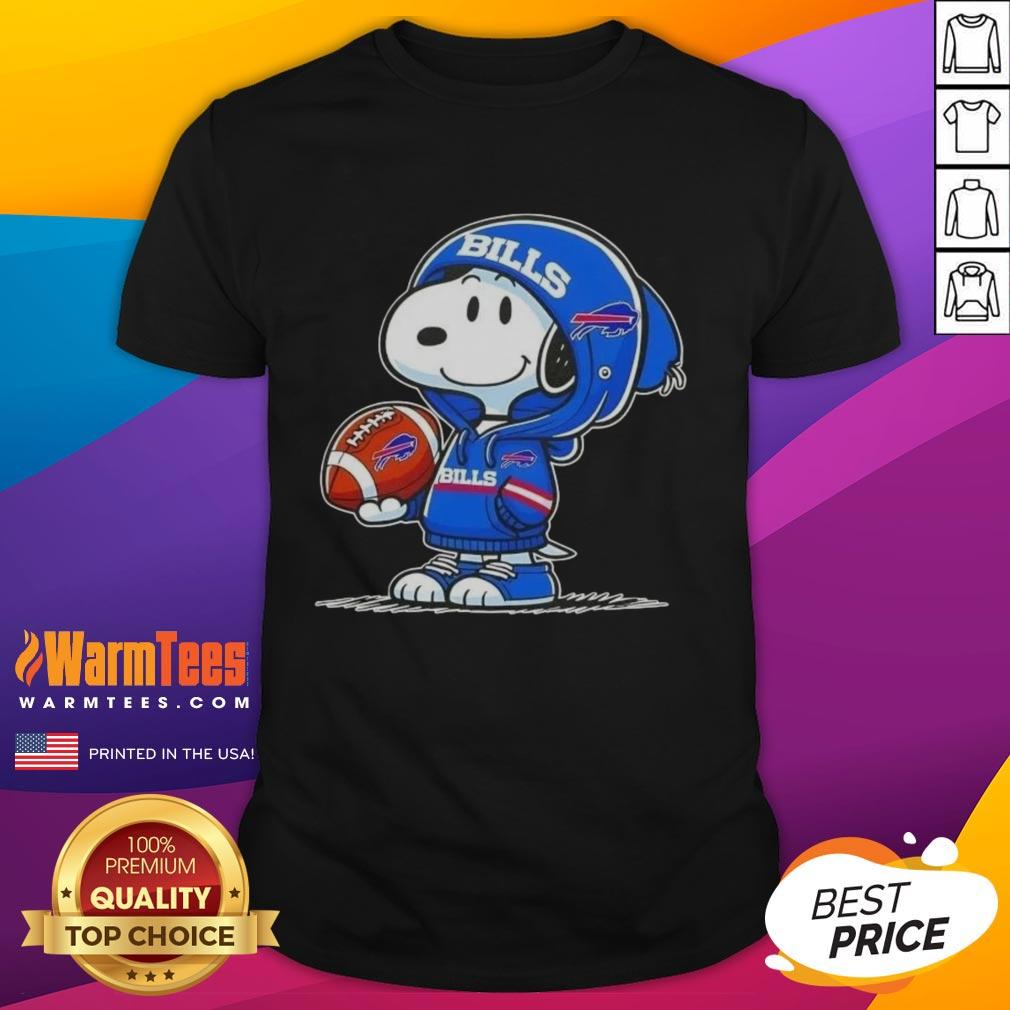 good-peanuts-snoopy-wearing-hoodie-buffalo-bills-and-smilling-at-fans-t-shirt Alt Text: Snoopy in a hoodie smiling at fans on a 'Good Peanuts' T-shirt featuring the Buffalo Bills logo.