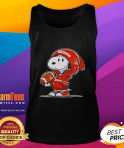Alt Text: Snoopy wearing a Cleveland Browns hoodie, smiling at fans while showcasing a tank top featuring Good Peanuts design.