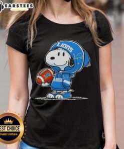 Snoopy in a Detroit Lions hoodie smiles at fans, featured on a ladies tee - Good Peanuts collection.