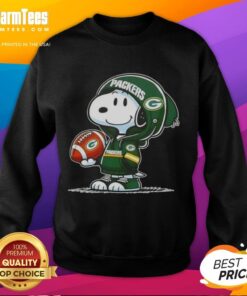 Snoopy wearing a Green Bay Packers hoodie smiles at fans while showcasing a Good Peanuts sweatshirt.