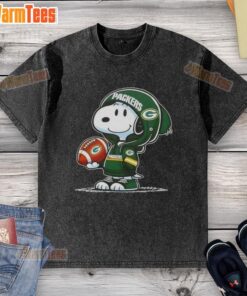 Good Peanuts Snoopy wearing a Green Bay Packers hoodie, smiling at fans on a washed t-shirt design.