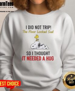 Cozy sweatshirt featuring Snoopy and Woodstock with the quote about hugging the sad floor, perfect for casual wear.