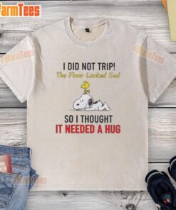 Good Snoopy and Woodstock t-shirt featuring the quote about hugging a sad floor, perfect for fans of Peanuts.