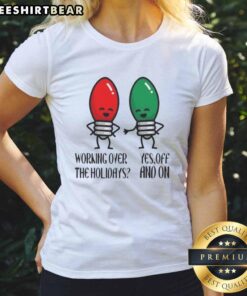 Funny Christmas joke ladies tee featuring 'Good Working Over The Holidays' design for festive humor and holiday spirit.