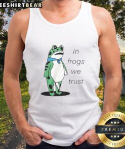 Happy Portland frog wearing 'In Frogs We Trust' tank top, showcasing Portland's quirky style and amphibian love.