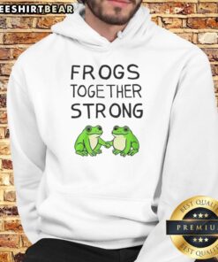 Happy Portland frogs wearing 'Together Strong' hoodie, showcasing vibrant colors and a playful design in a cheerful setting.