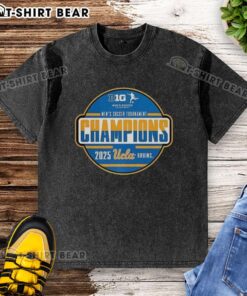 UCLA Big Ten Men's Soccer Tournament Champions 2025 in a happy celebration, wearing a washed t-shirt with the team's logo.
