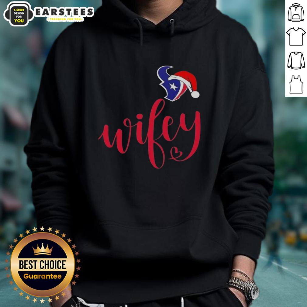 happy-wifey-houston-texans-santa-hat-merry-christmas-hoodie Happy Wifey in a Houston Texans hoodie with a Santa hat, celebrating a Merry Christmas in festive style.