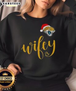 Happy Wifey Jacksonville Jaguars sweatshirt with Santa hat, perfect for a festive Merry Christmas celebration.