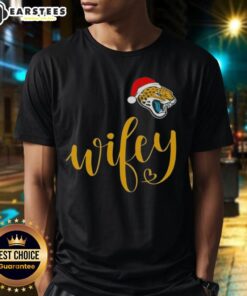 Alt Text: Happy Wifey Jacksonville Jaguars Christmas T-Shirt with Santa Hat design, perfect for holiday celebrations.
