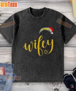 Happy Wifey wearing a Los Angeles Chargers Santa hat on a Merry Christmas washed t-shirt, celebrating the holiday season.