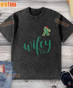Happy Wifey Oakland Athletics Santa Hat Merry Christmas washed t-shirt featuring festive design and team colors.