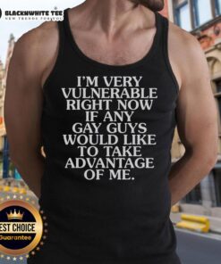 Man in a tank top expressing vulnerability, inviting gay guys to connect with him. Hot and open to new experiences.