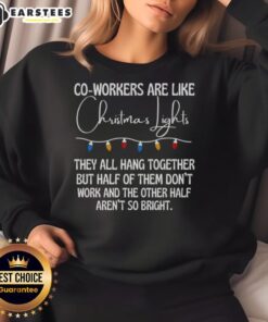 Cozy sweatshirt featuring 'Nice Co-Workers Are Like Christmas Lights' design, perfect for festive office wear.