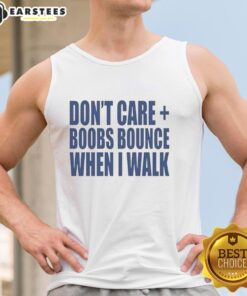 Model wearing 'Nice Don't Care Boobs Bounce When I Walk' tank top, showcasing a casual and confident style.