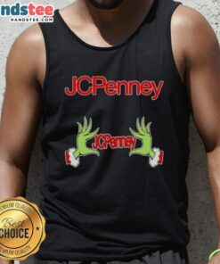 Festive JCPenney Christmas tank top featuring the Grinch with hands forming a heart, perfect for holiday cheer.