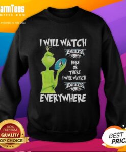 Cozy sweatshirt featuring the Grinch and 'I Will Watch Philadelphia Eagles Everywhere' slogan for fans.