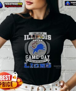Alt Text: Ladies tee featuring 'Nice, I May Live in Illinois But on Game Day' for Detroit Lions football fans.
