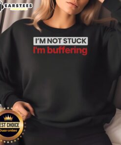 Cozy 'Nice, I'm Not Stuck, I'm Buffering' sweatshirt in a casual setting, perfect for tech lovers and humor enthusiasts.