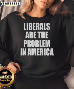 Alt Text: Nice Liberals Are The Problem In America sweatshirt featuring bold text design on a casual garment.