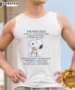 Alt Text: Snoopy tank top featuring 'I'm old, I woke up, I lifted my arms, I moved my knees' quote with playful design.