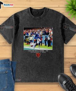 Alt Text: Official Caleb Williams Chicago Bears NFL Flash Features Week 10 Washed T-Shirt showcasing team colors and logo.