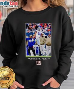 Alt Text: Darius Slayton wearing New York Giants NFL Week 10 sweatshirt, showcasing team pride and style.