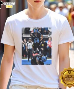 Official Detroit Lions Spiderman Amon-Ra St. Brown Superman T-Shirt featuring vibrant graphics and team colors.