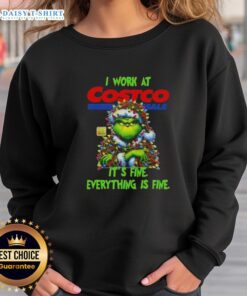 Alt Text: Official Grinch Christmas Tree sweatshirt from Costco Wholesale featuring the phrase 'I Work At It's Fine Everything Is Fine'.