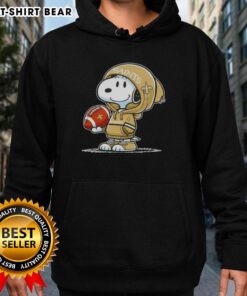 Snoopy wearing a New Orleans Saints hoodie, smiling at fans, showcasing his official Peanuts merchandise.
