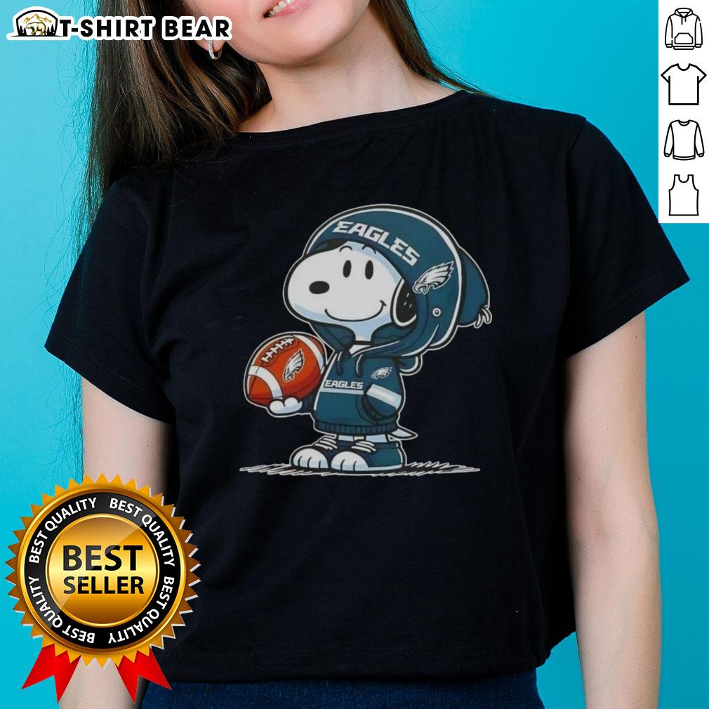 Official Peanuts Snoopy Wearing Hoodie Philadelphia Eagles And Smilling At Fans Ladies-Tee Official Peanuts Snoopy in a hoodie, smiling at fans in a Philadelphia Eagles tee for ladies.
