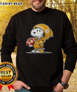 Snoopy wearing a Pittsburgh Steelers hoodie, smiling at fans in an official Peanuts sweatshirt.