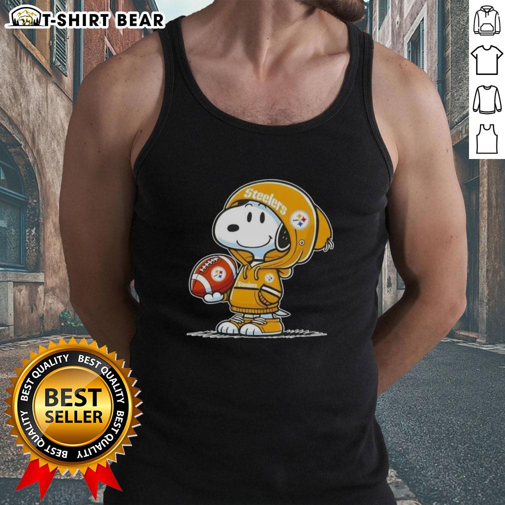 Official Peanuts Snoopy Wearing Hoodie Pittsburgh Steelers And Smilling At Fans Tank Top Alt Text: Snoopy in a hoodie supporting the Pittsburgh Steelers, smiling at fans while wearing a tank top. Official Peanuts merchandise.