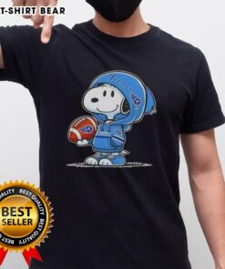 Snoopy wearing a Tennessee Titans hoodie smiles at fans on a fun graphic t-shirt featuring Peanuts characters.