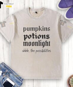 Alt Text: Official Pumpkins Potions Moonlight Ohhh The Possibilities washed t-shirt design featuring whimsical Halloween graphics.