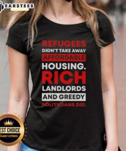 Official tee featuring text: 'Refugees Didnt Take Away Affordable Housing, Rich Landlords And Greedy Politicians Did.'