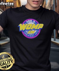 Official Womp FM Greatest Hits T-Shirt featuring vibrant graphics and classic design for music lovers and collectors.