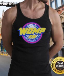 Alt Text: Official Womp FM Greatest Hits tank top featuring vibrant graphics and a stylish design for music lovers.