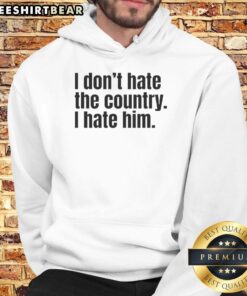 Original 'I Don't Hate The Country, I Hate Him' Hoodie in black, featuring bold white text, perfect for statement fashion.