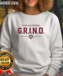 Alt Text: Original Texas A&M Football G.R.I.N.D. logo sweatshirt featuring a bold design perfect for fans and casual wear.