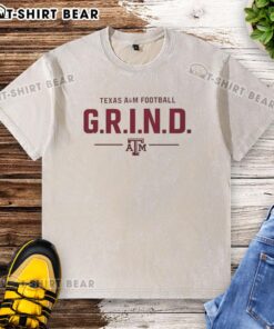 Original Texas A&M Football G.R.I.N.D. logo washed t-shirt featuring a stylish design for Aggies fans.