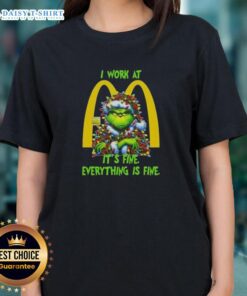 Premium Grinch Christmas Tree tee featuring 'I work at McDonald's, it's fine' for festive holiday style.