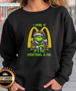 Alt Text: Premium Grinch Christmas Tree sweatshirt featuring I work at McDonald's, it's fine, everything is fine design.