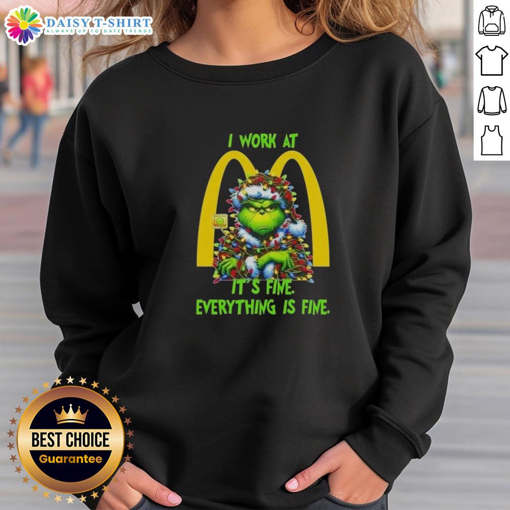 Premium Grinch Christmas Tree X Mcdonald's I Work At It's Fine Everything Is Fine Sweatshirt Alt Text: Premium Grinch Christmas Tree sweatshirt featuring I work at McDonald's, it's fine, everything is fine design.