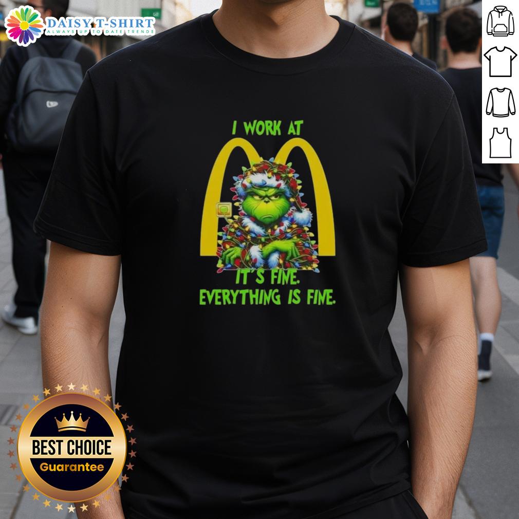 Premium Grinch Christmas Tree X Mcdonald's I Work At It's Fine Everything Is Fine T-Shirt Alt Text: Premium Grinch Christmas Tree X McDonald's t-shirt design featuring I Work At It's Fine Everything Is Fine slogan.