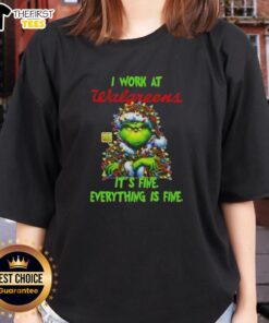 Premium Grinch Christmas Tree tee from Walgreens, featuring 'I Work At It's Fine Everything Is Fine' design for women.