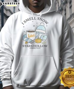 Premium 'I Smell Snow' Christmas Hoodie from Stars Hollow, Connecticut, featuring a cozy design perfect for winter festivities.