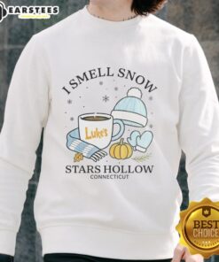 Alt Text: Premium 'I Smell Snow' Christmas sweatshirt from Stars Hollow, Connecticut, featuring festive winter designs.