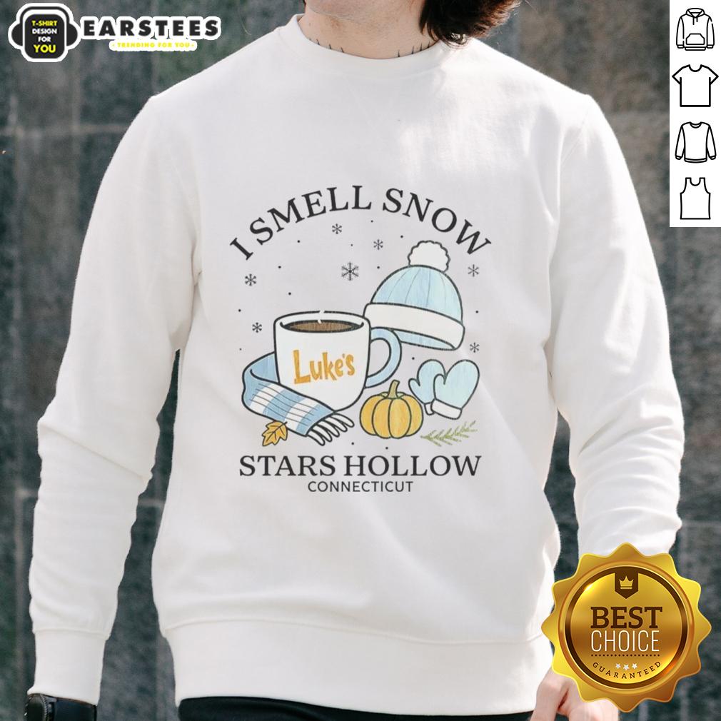 premium-i-smell-snow-stars-hollow-connecticut-christmas-sweatshirt Alt Text: Premium 'I Smell Snow' Christmas sweatshirt from Stars Hollow, Connecticut, featuring festive winter designs.