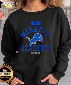 Alt Text: Premium NFL Detroit Lions Miracle Academy Nahmias Sweatshirt in blue with logo, perfect for fans and chilly days.